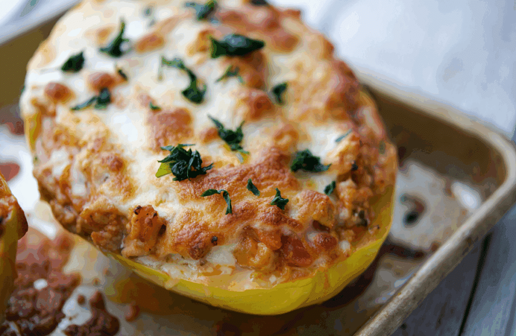 a close up of chicken parmesan spaghetti squash