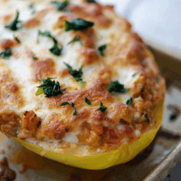 a close up of chicken parmesan spaghetti squash