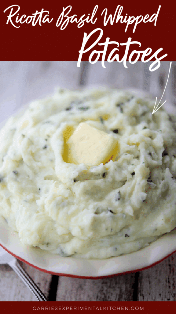 ricotta basil whipped potatoes in a bowl with melting butter