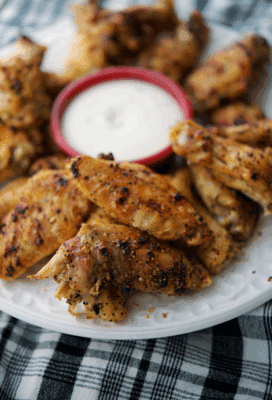 lemon pepper chicken wings in a white plate