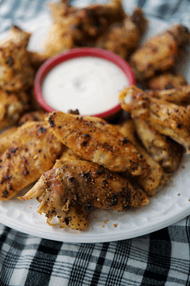 lemon pepper chicken wings in a white plate